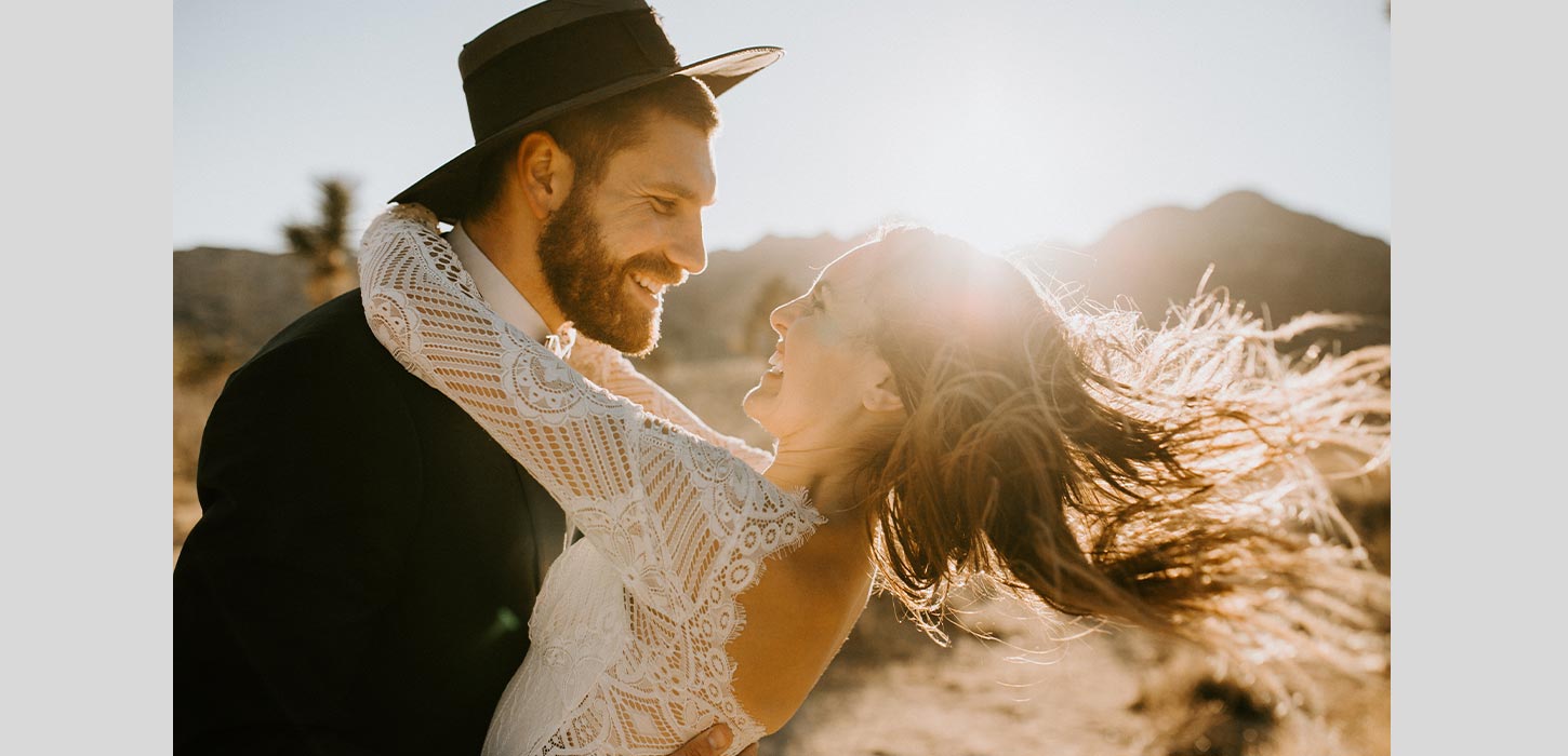 Bride wearing long sleeve lace wedding dress