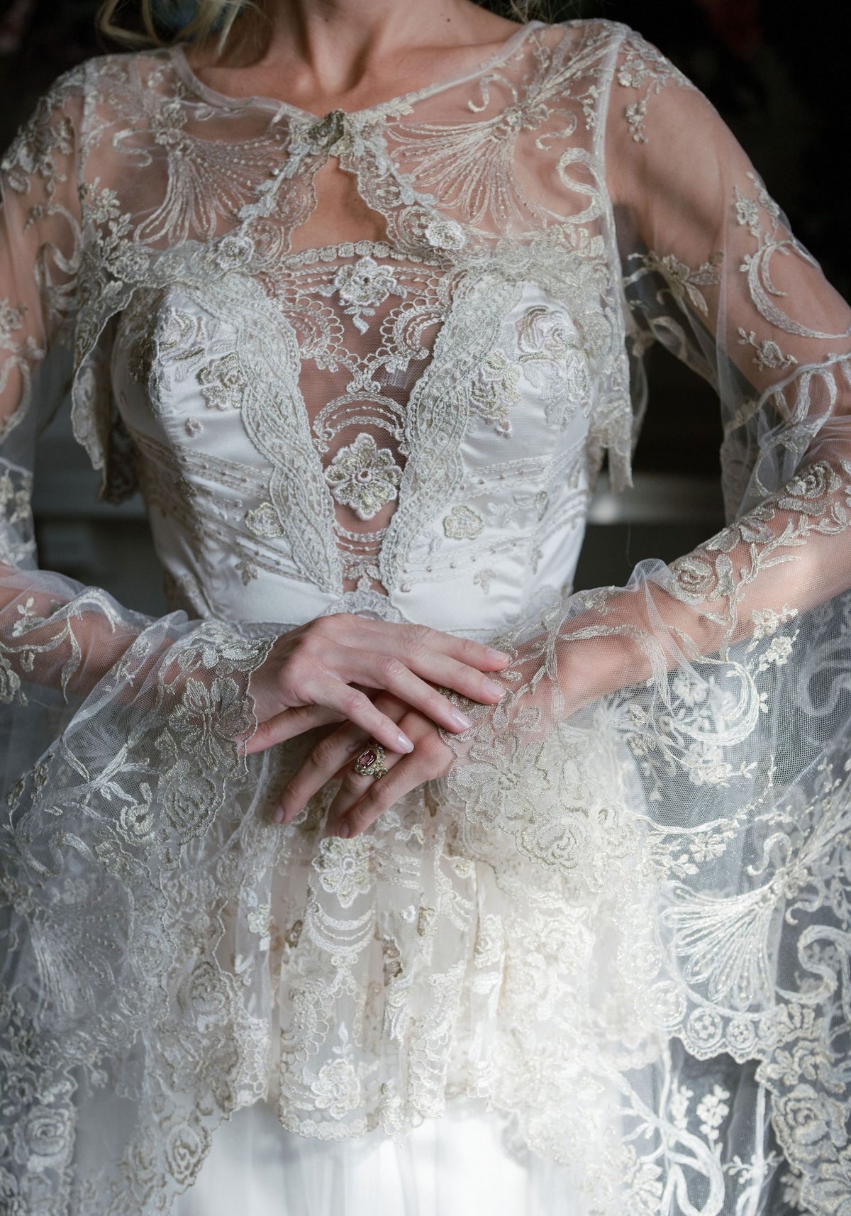 Detail of the Filigree Bolero sheer embroidered bell sleeves with scalloped lace borders