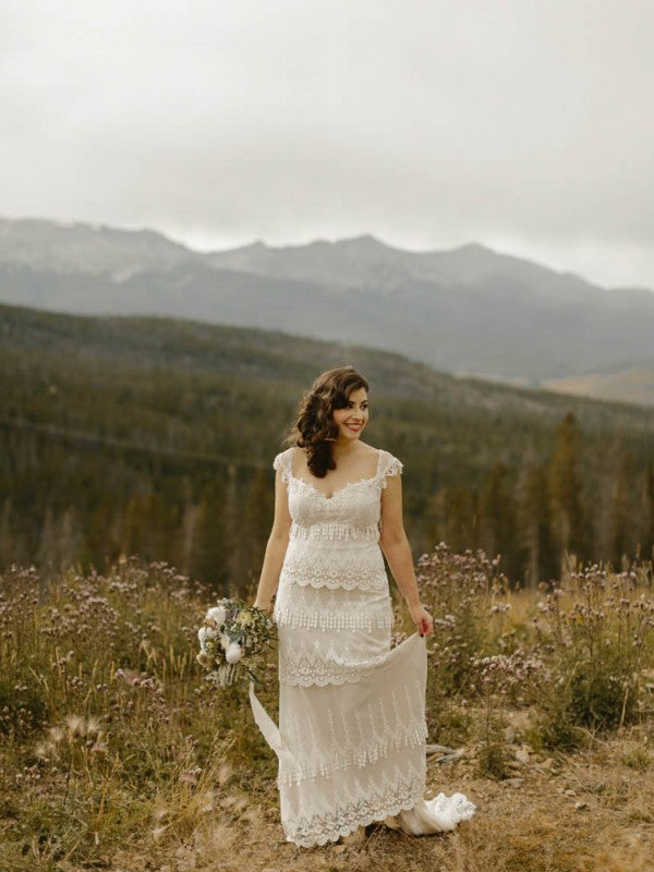 Bride in mountain valley wearing the Kristene wedding dress