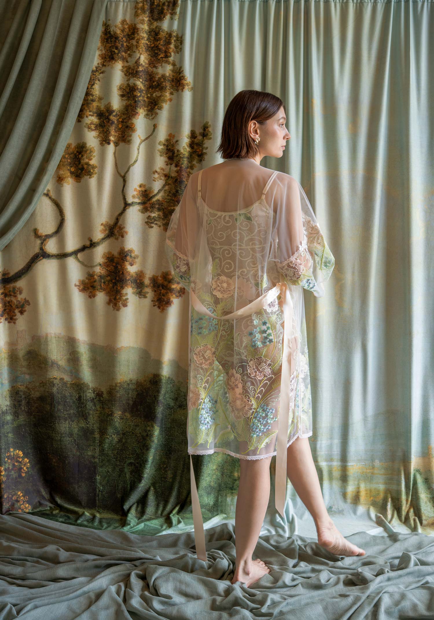 Sheer kimono robe with delicate spring floral embroidery and 3D blossom appliqués.