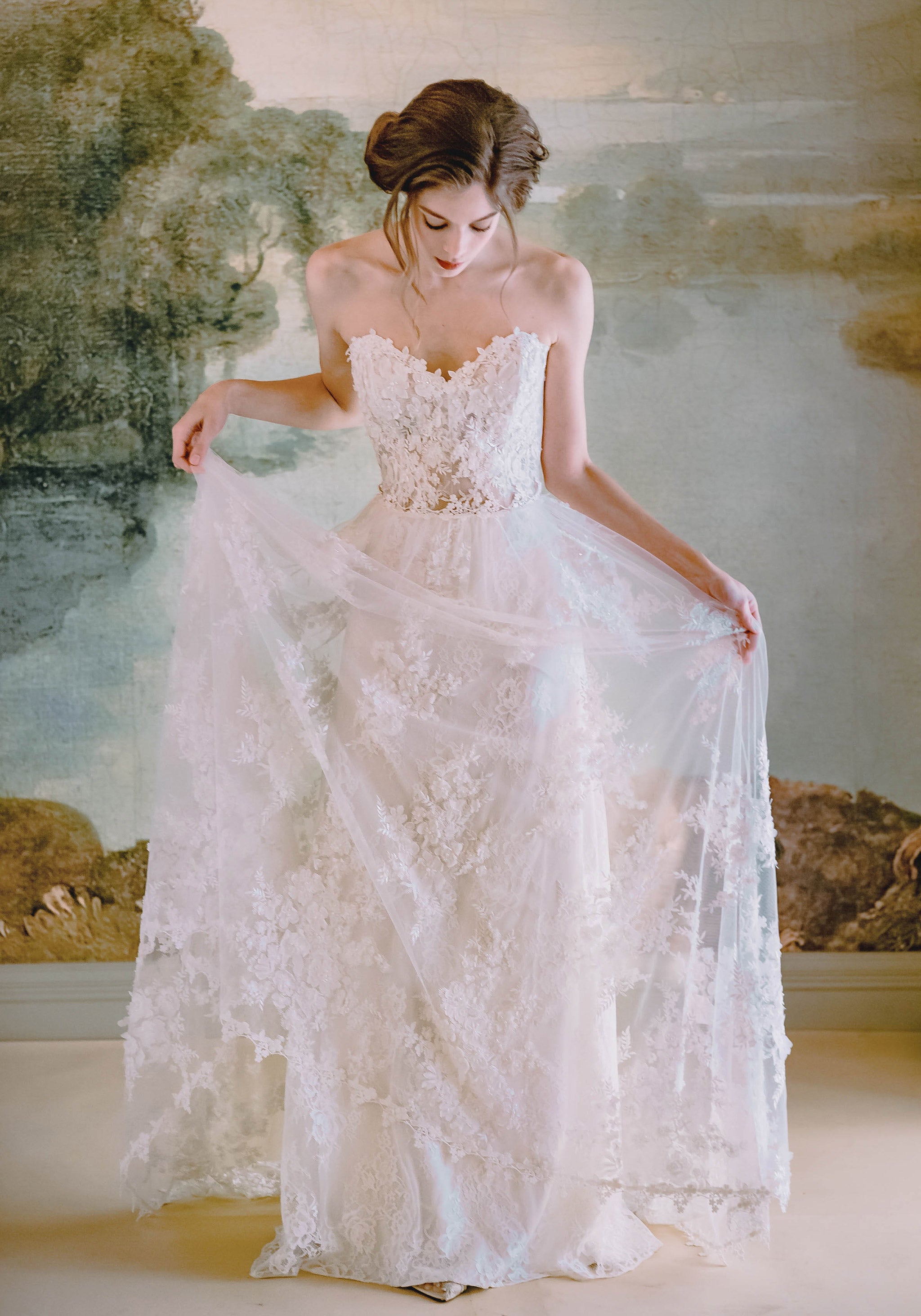 Floral embroidered corset wedding dress by Claire Pettibone