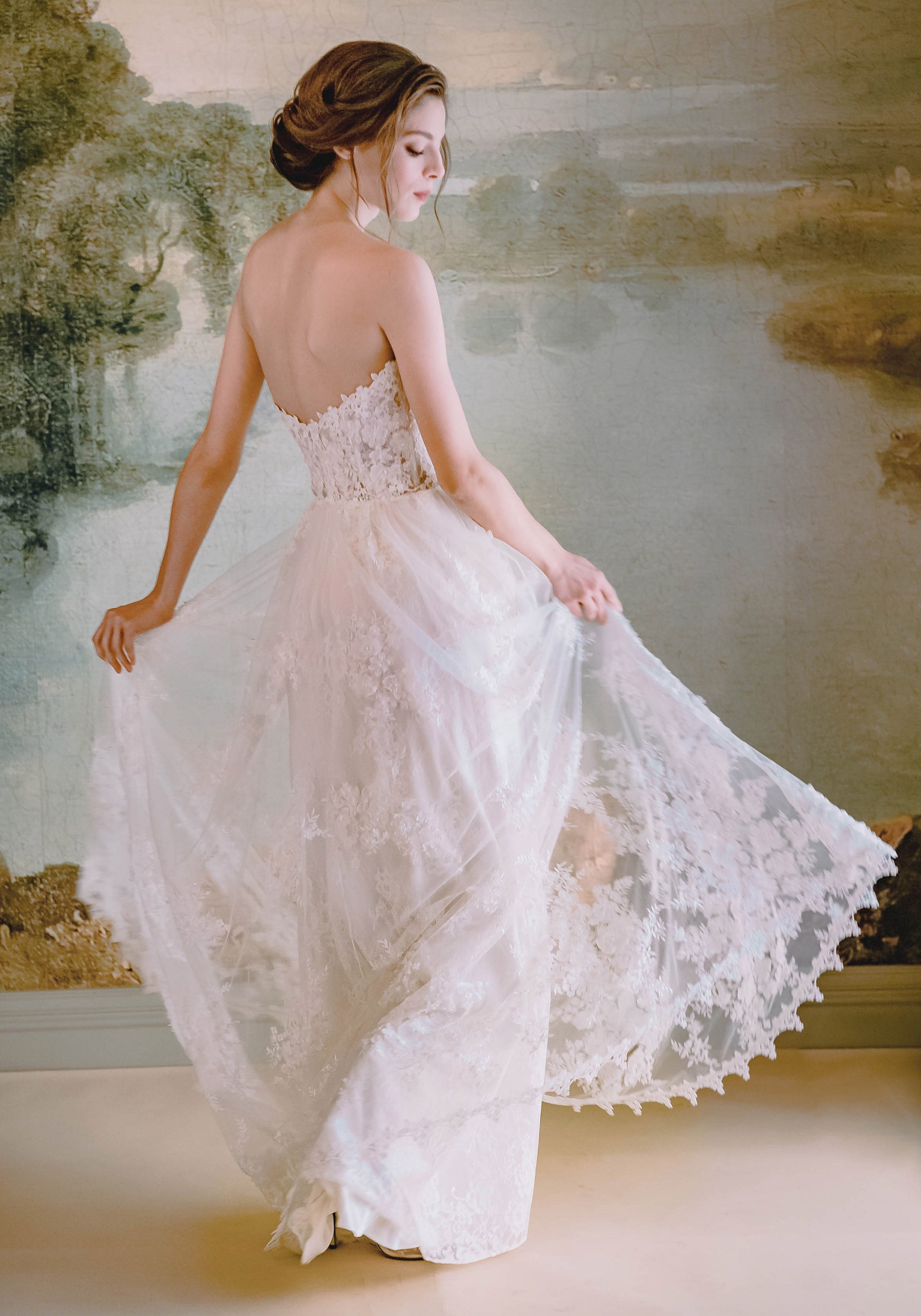 Model in floral A-line wedding dress