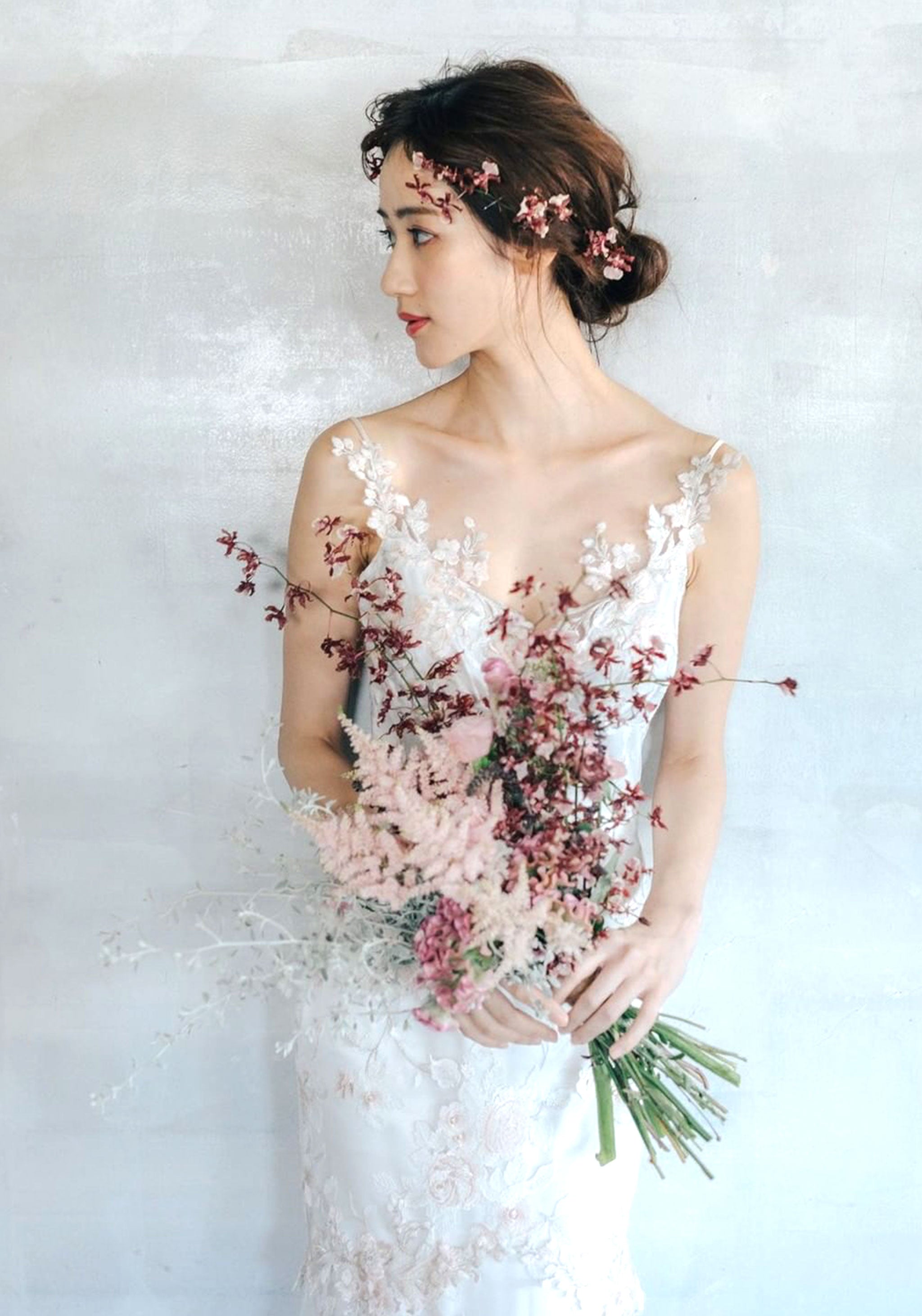 April floral embroidered wedding dress by Claire Pettibone