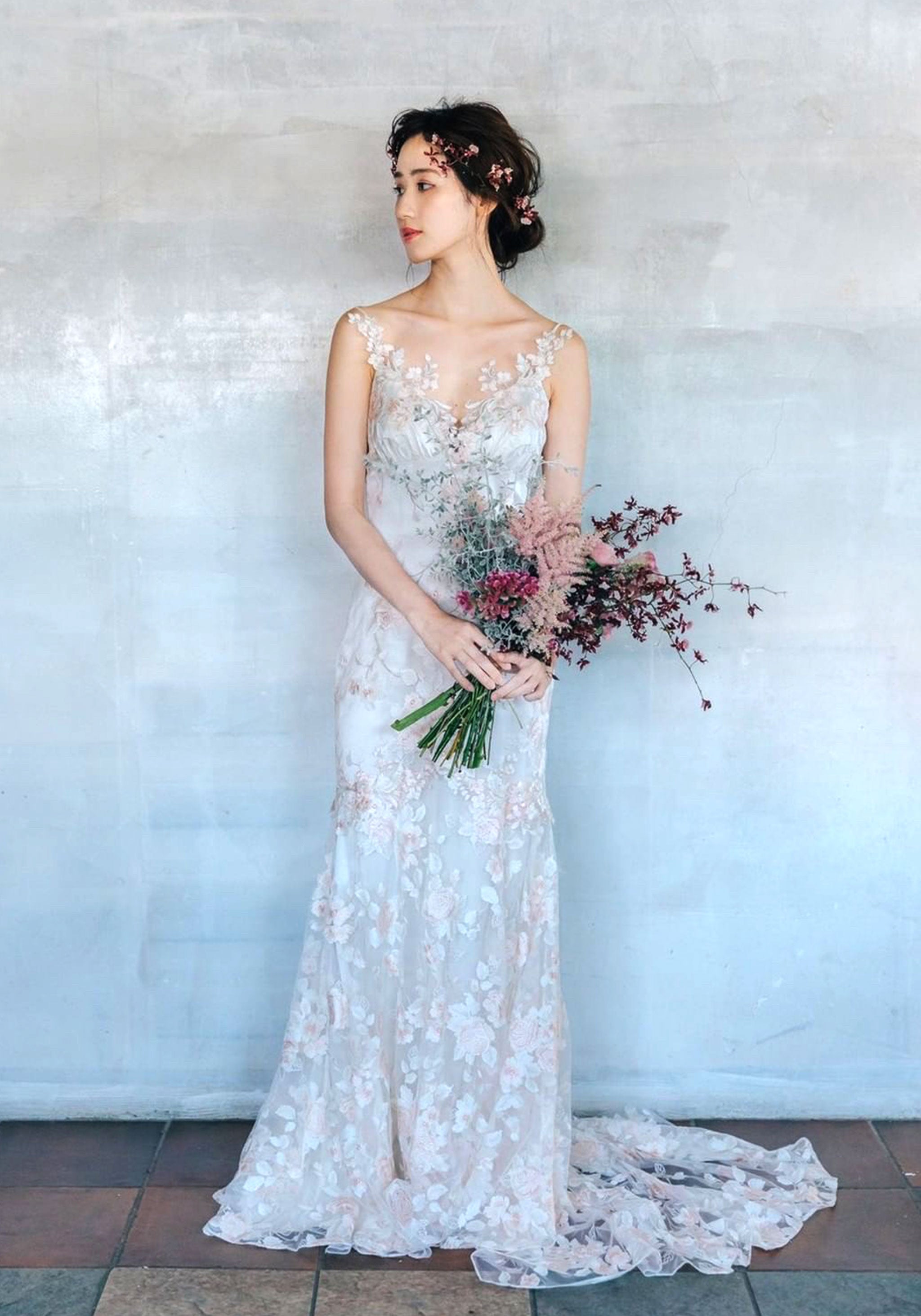 April floral embroidered wedding dress by Claire Pettibone