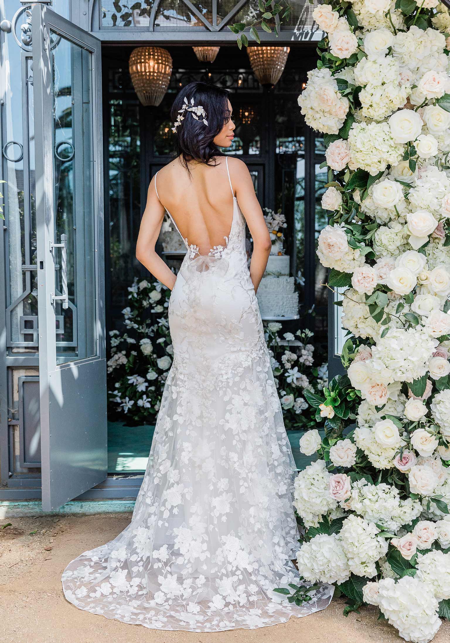 Low back floral embroidered wedding dress by Claire Pettibone