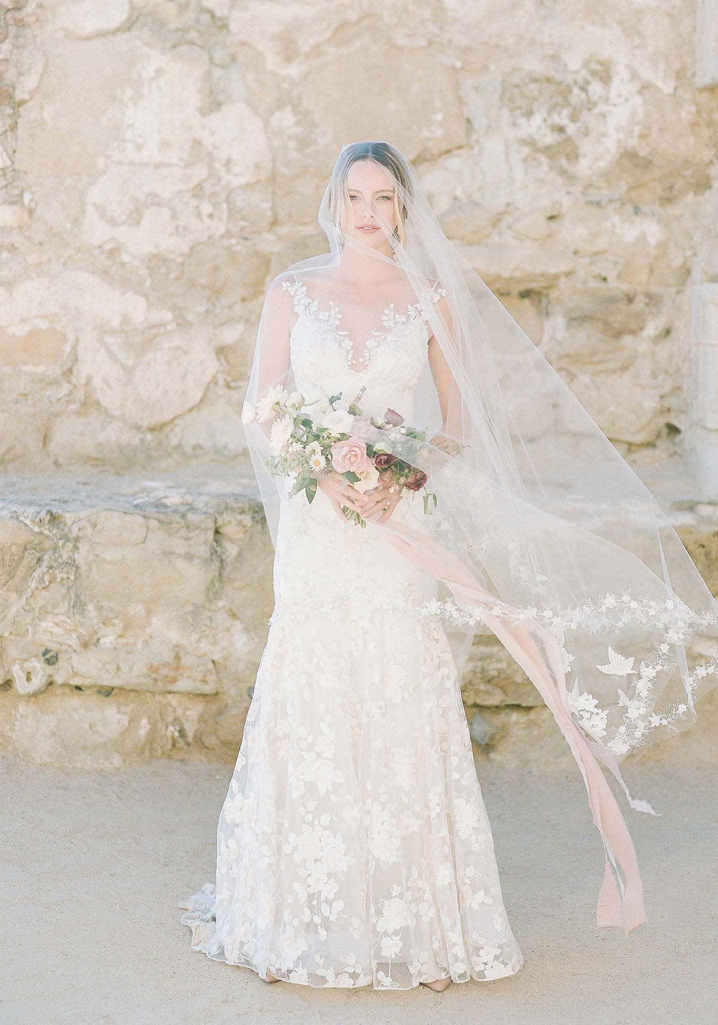 April floral embroidered wedding dress by Claire Pettibone