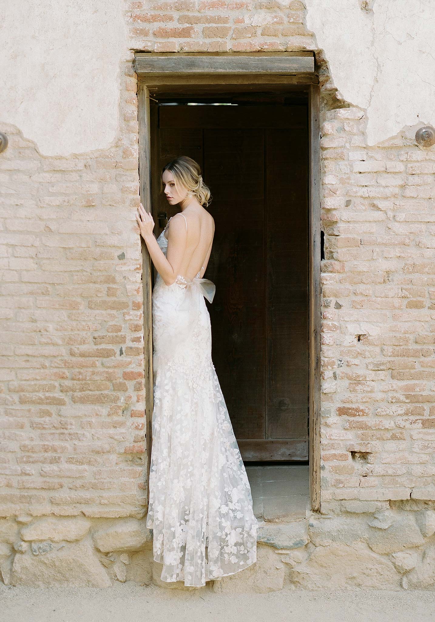 April floral embroidered wedding dress by Claire Pettibone