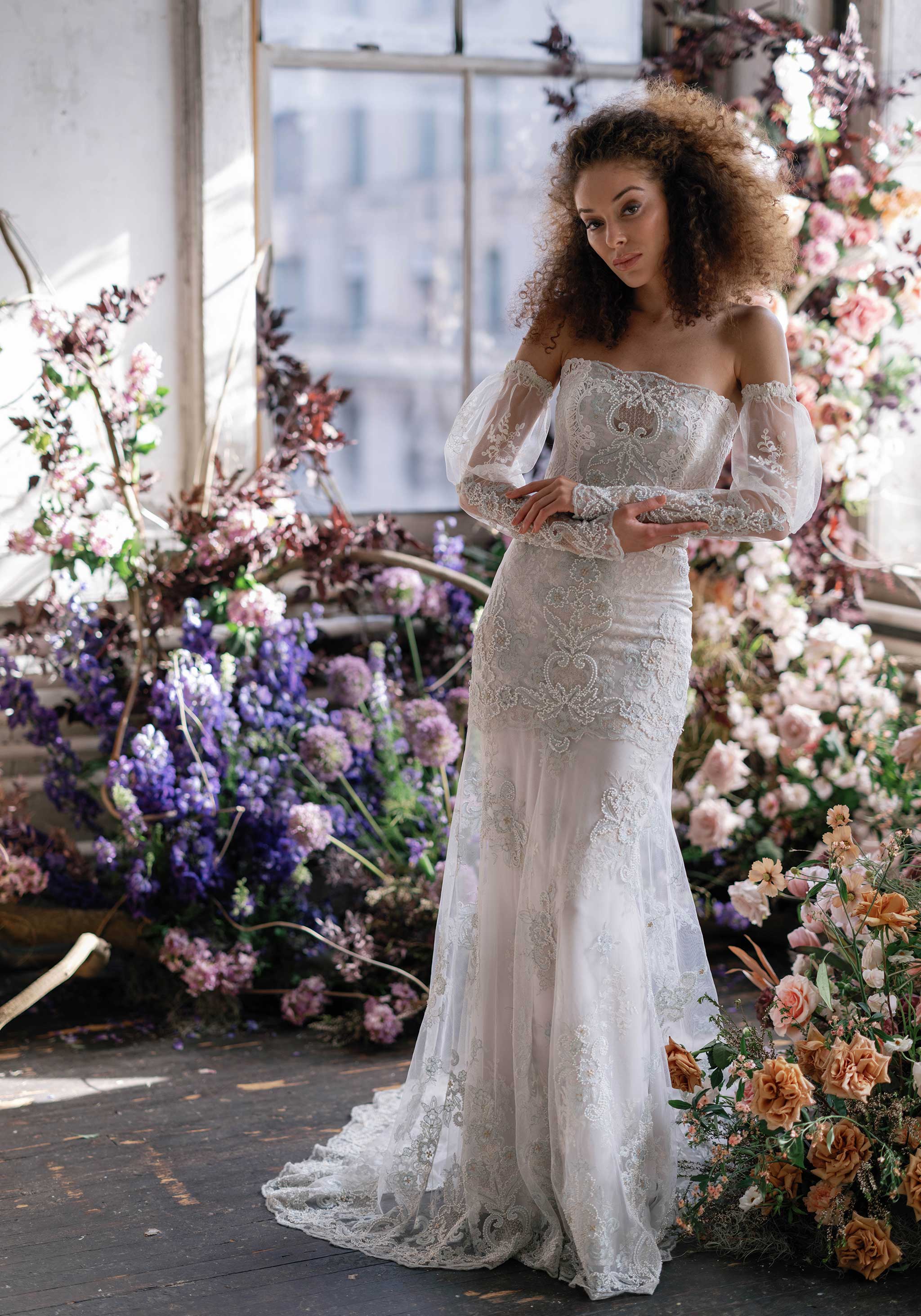 Aquamarine lace designer wedding dress by Claire Pettibone