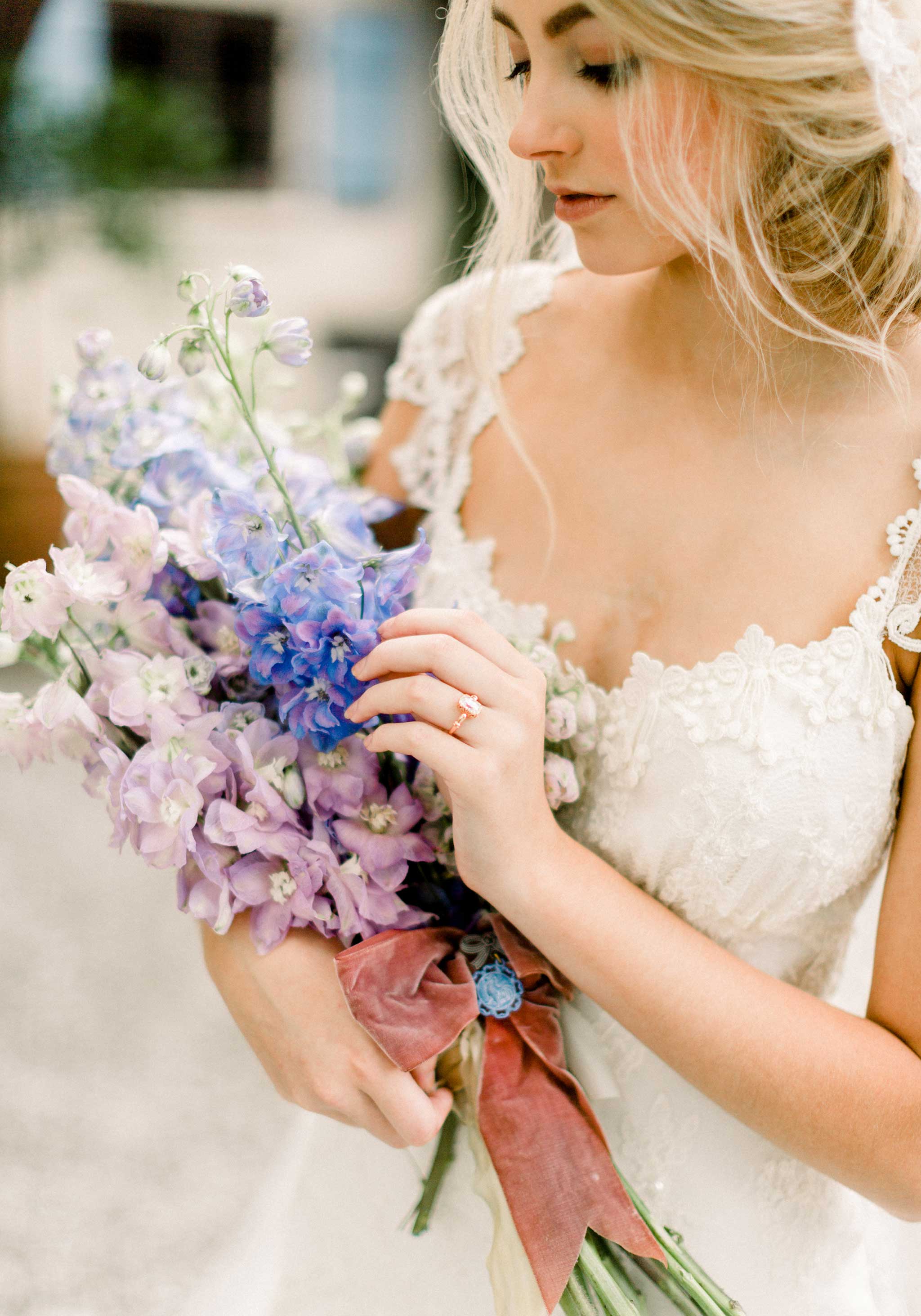Bride holding floral boquet