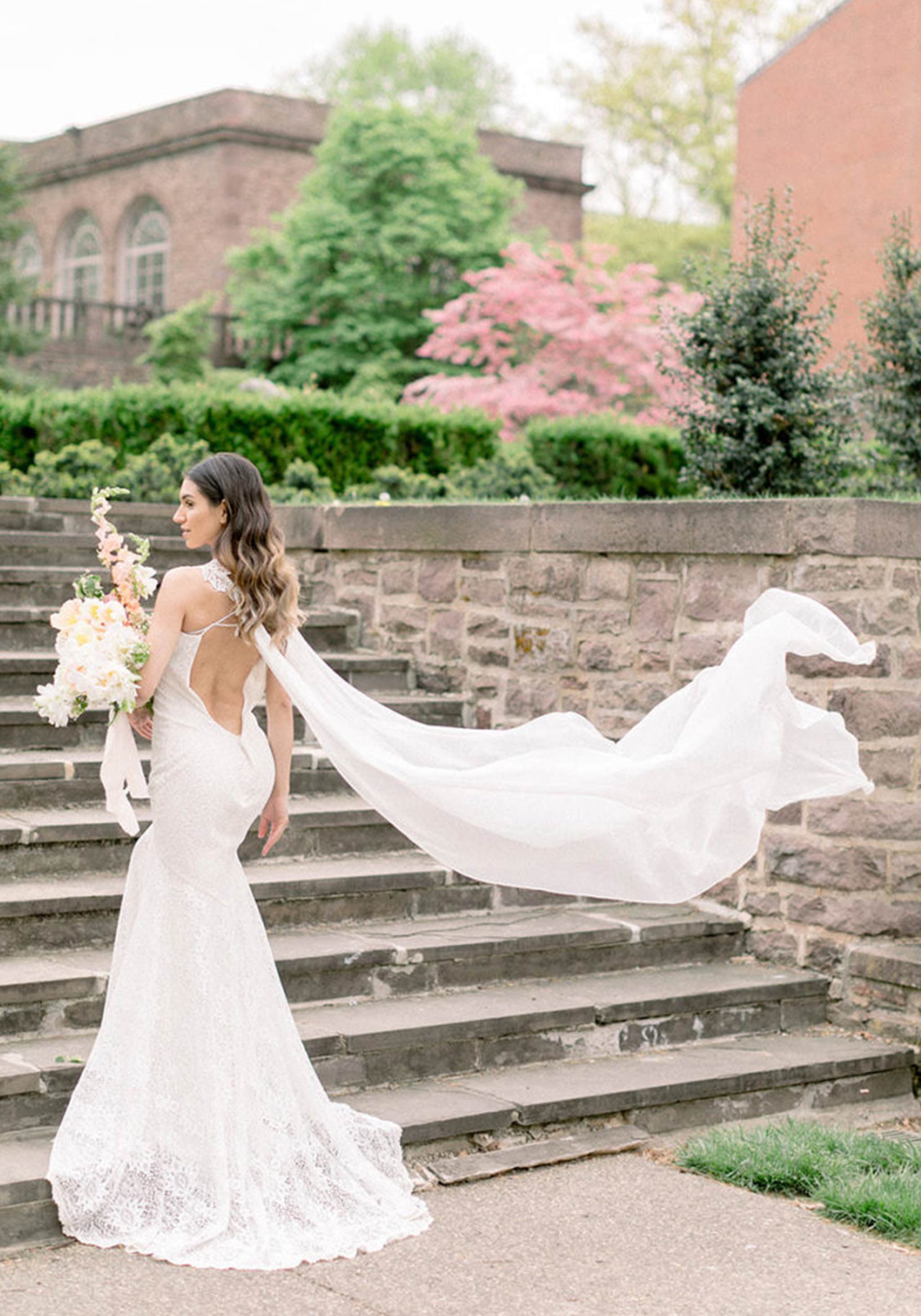 Saratoga wedding dress with flowing cape sleeves
