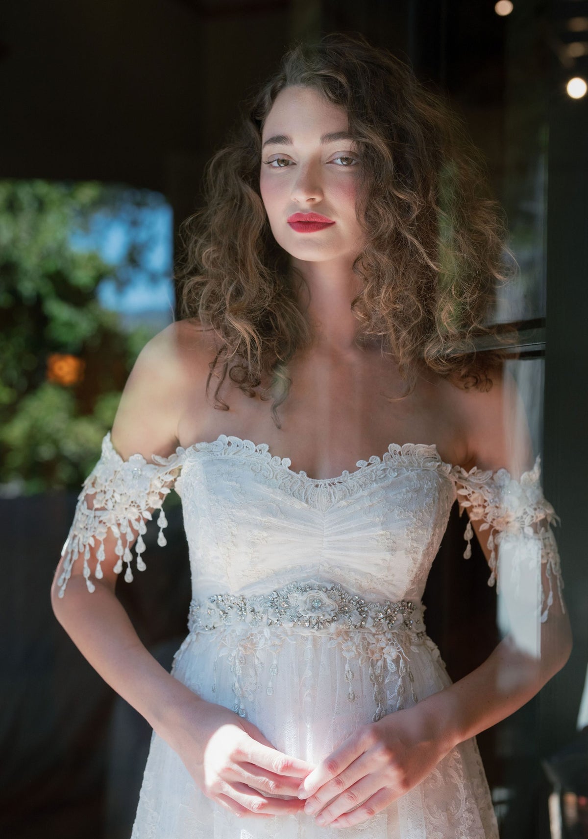 Detail of the Amourette sweetheart bodice, rhinestone beaded empire waist and beaded Guipure lace sleeves