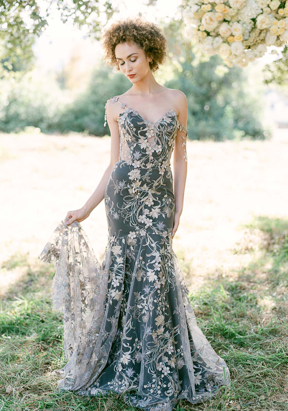 Lunaria wedding dress with black silk and pearl embellishments by Claire Petttibone