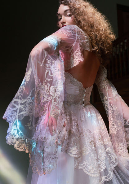 Open back of the Filigree Bolero with cascading embroidered bell sleeves