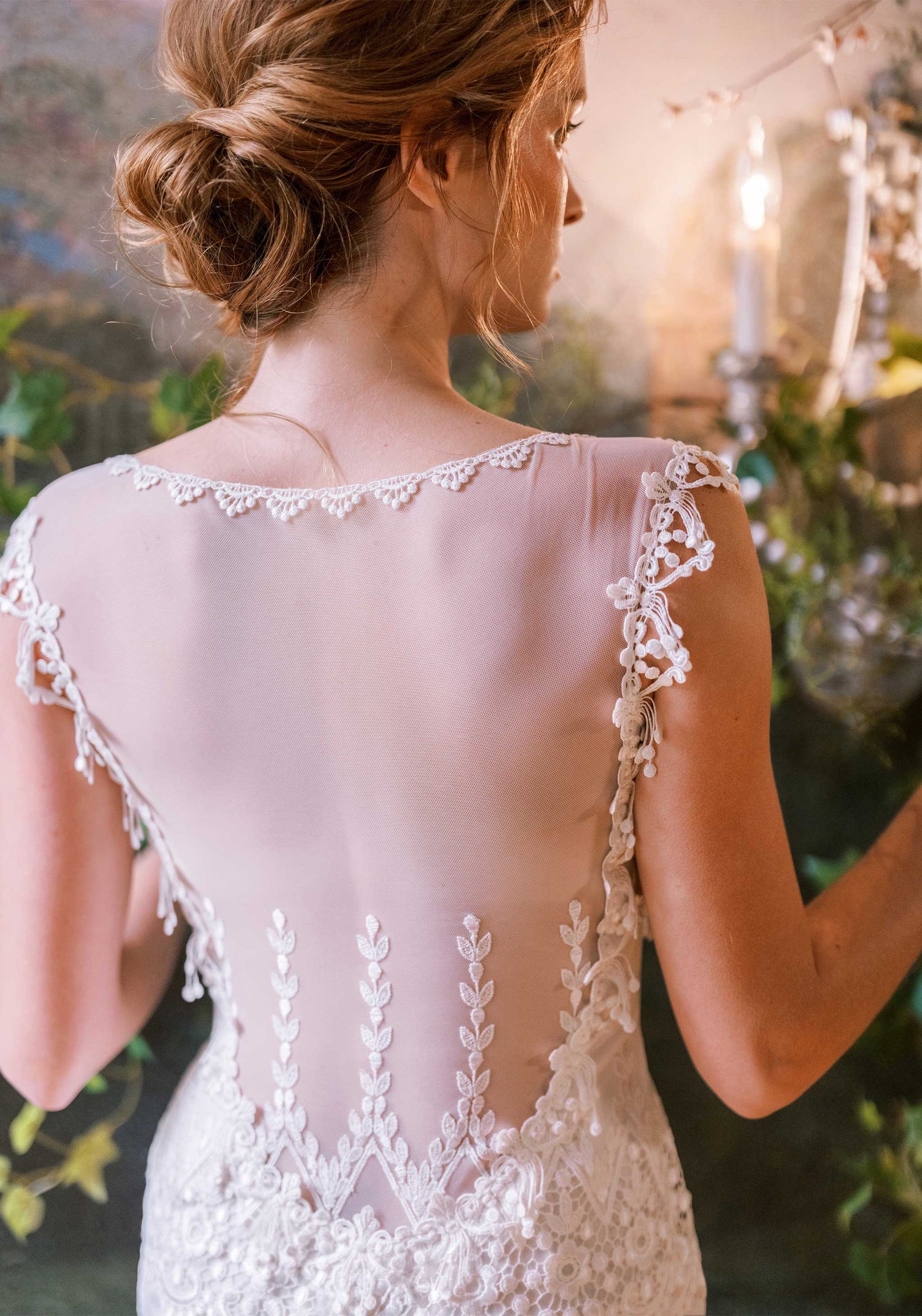 Sheer back party dress by designer Claire Pettibone