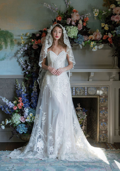 Bride in the Narcisse lace wedding dress and lace mantilla veil at the Rhine House, Beringer Vineyards