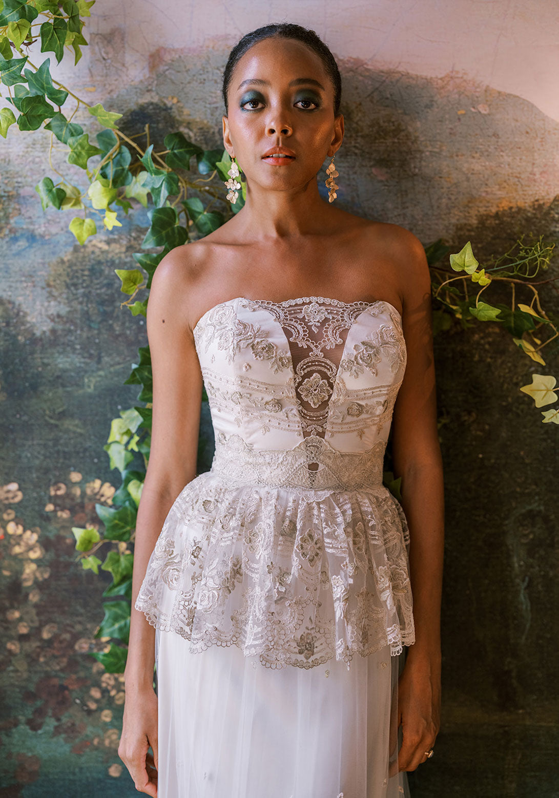 Front view of Claire Pettibone Primrose gown with gold lace and floral embroidery.