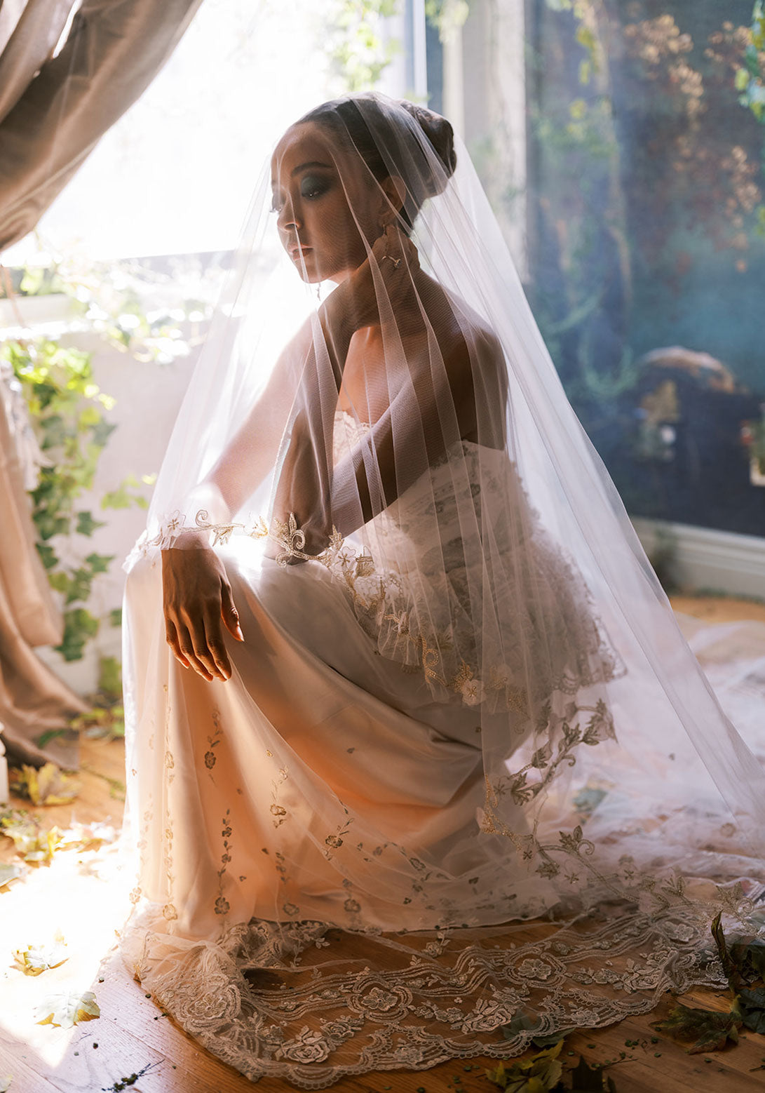 Bride under veil in Primrose Wedding Dress 