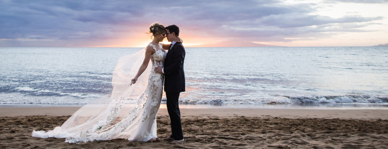 Bride and Groom Photo on Beach at Bride Wears a Custom Claire Pettibone Wedding Dress Odessa