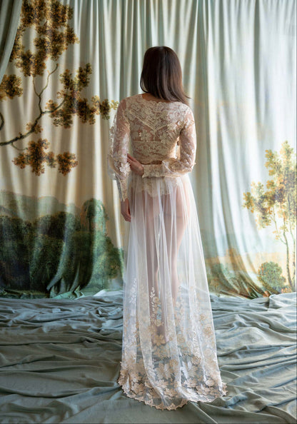 Sheer tulle boudoir robe featuring ecru floral embroidery and an intricate lace-inlaid bodice.