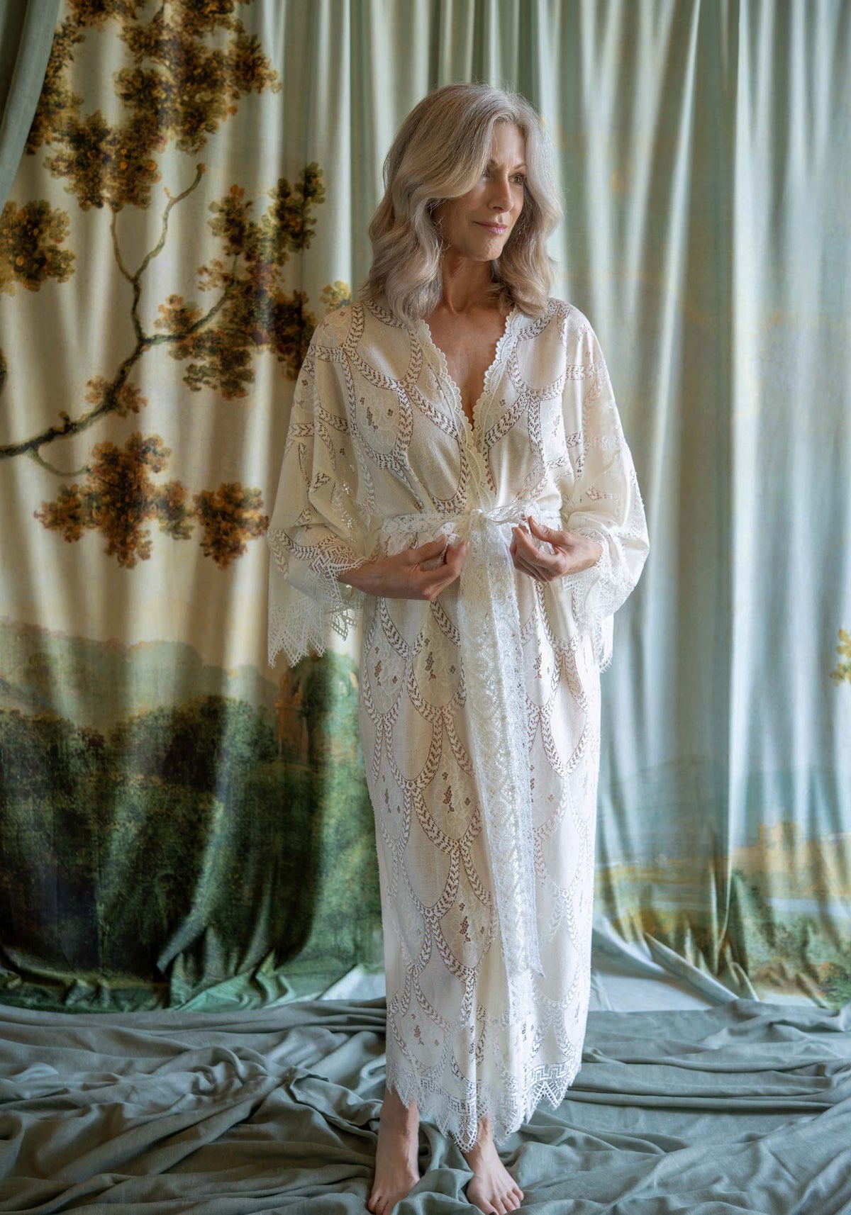 Bohemian-style ivory and cream cross-dyed lace kimono robe with a natural, textured finish.