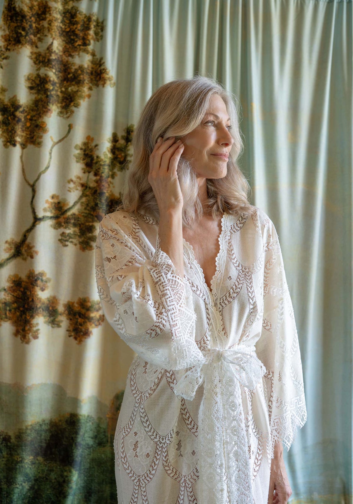 Bohemian-style ivory and cream cross-dyed lace kimono robe with a natural, textured finish.
