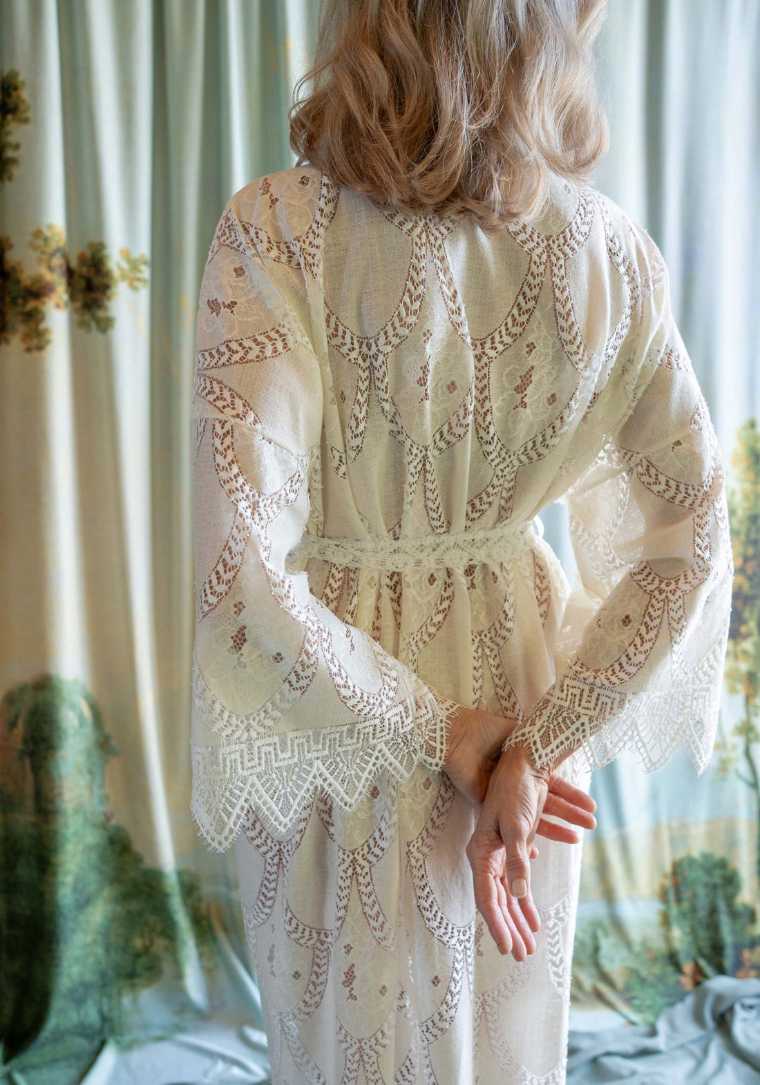 Bohemian-style ivory and cream cross-dyed lace kimono robe with a natural, textured finish.