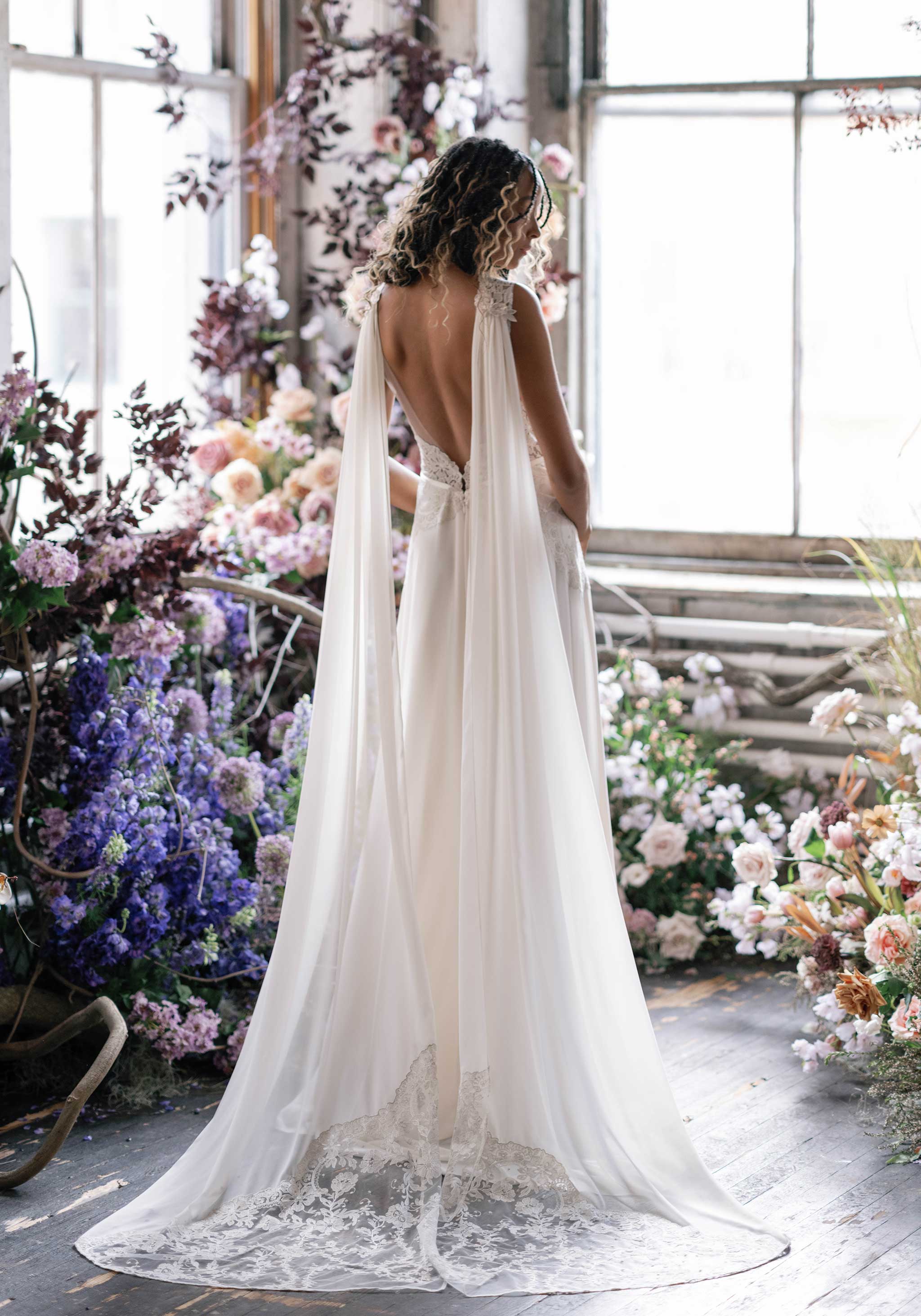 Model in a-line wedding dress by Claire Pettibone