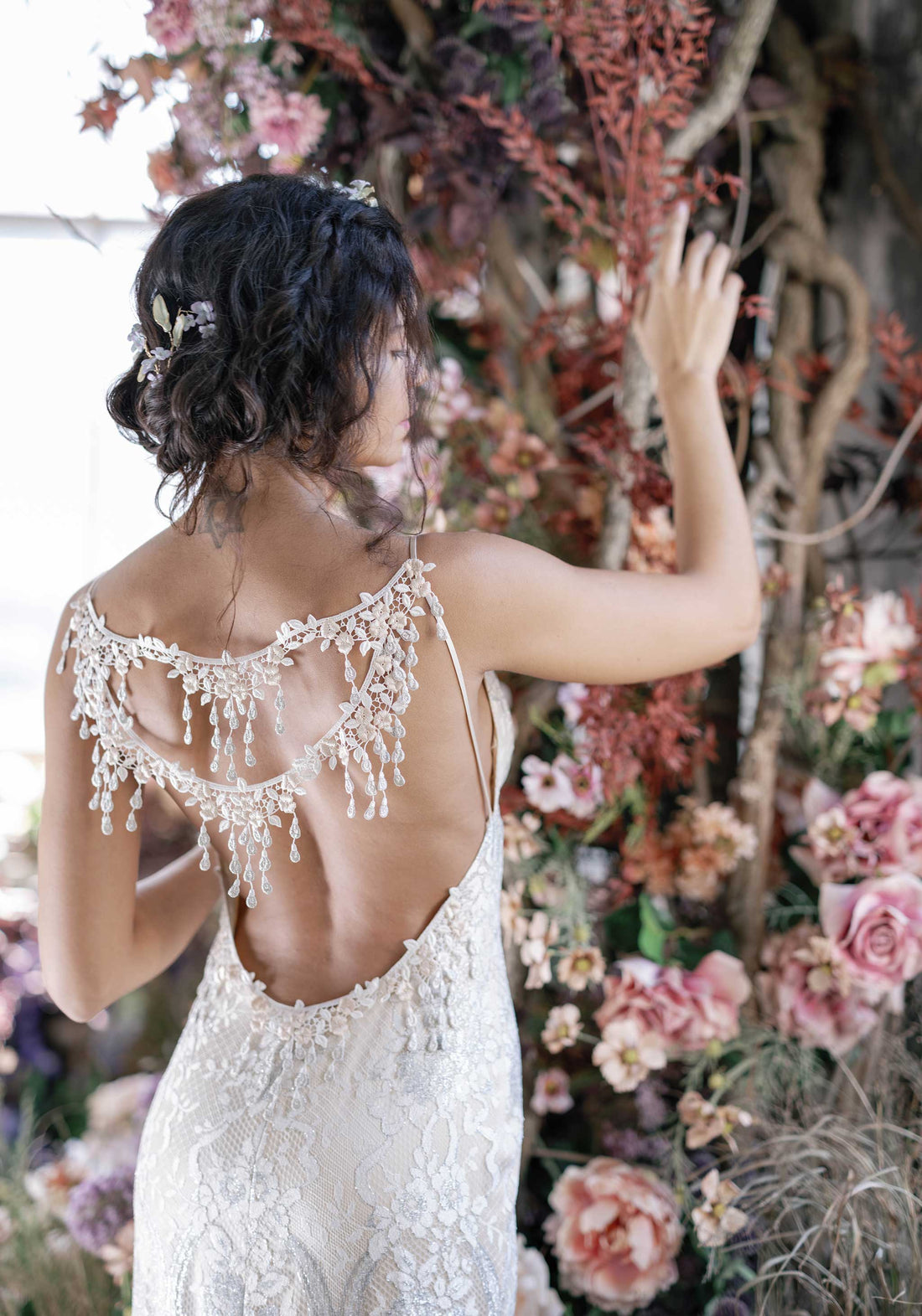 Briolette Low Back Wedding Dress with trims adorning the open back design