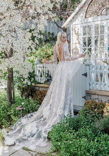 Luxury Wedding Dress Cherry Blossom designed by Claire Pettibone with custom floral train cape