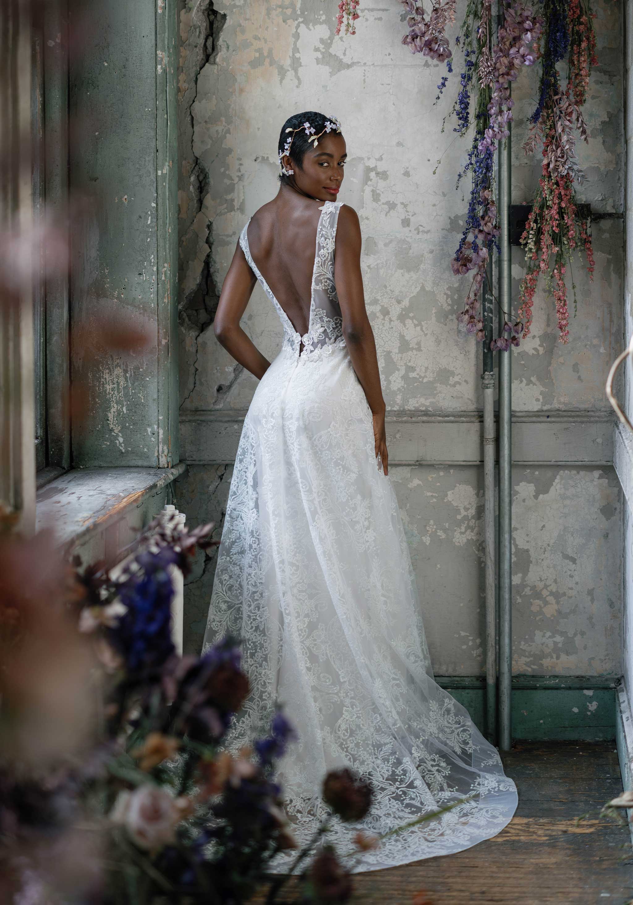 Crystal Wedding Dress with open plunging design by Claire Pettibone