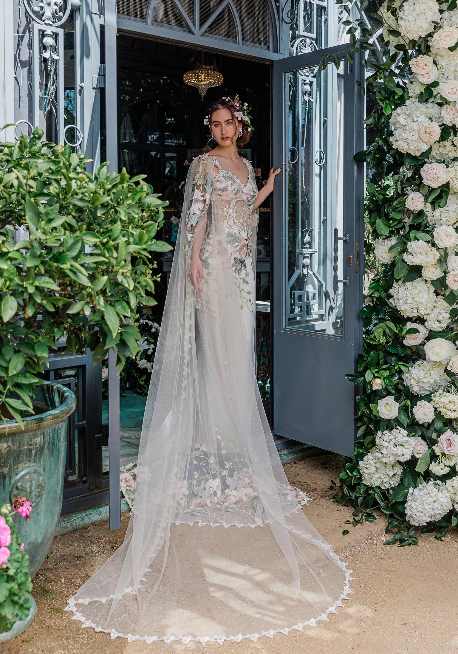 Peony Wedding Dress shown with Cape Sleeves Designed by Claire Pettibone